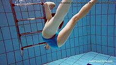 blue bikini hugs martina's tight pussy underwater suggestively