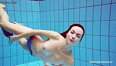 blue bikini hugs martina's tight pussy underwater suggestively