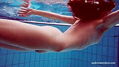 blue bikini hugs martina's tight pussy underwater suggestively