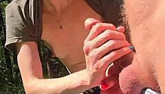 Wife gives quick handjob outdoor with pierced nipples