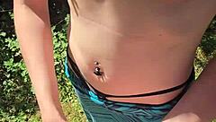 Wife gives quick handjob outdoor with pierced nipples