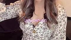 I filmed this beautiful asian ladyboy masturbating quietly in her one-piece dress.