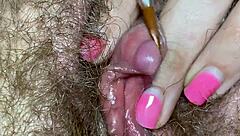 extreme close-up of clitoris in wild edging fetish clip