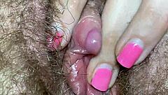 extreme close-up of clitoris in wild edging fetish clip