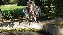 Hairy mature flashes nude beaver in public park without shame