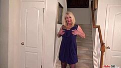 mature woman in black stockings relaxing alone.