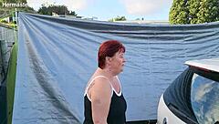 Kiwi MILF pisses outdoors at campground.