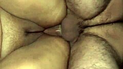 Man, eating my stepmother's pussy on all fours feels so good while pounding her hard with my cock until she moans.