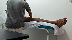 The doctor gives special attention and sensual massage to his female patient