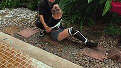 blonde teen beauty gets tangled up in park bondage