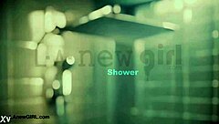 Brunette model with long hair takes shower during photoshoot