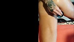 Oiled brunette wife stuffs toy deep in her wet pussy