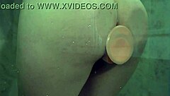 Babe Achieves Intense Orgasm in Shower Masturbation