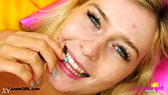 hey, check out this cute blonde model showing off her sexy body on the sofa