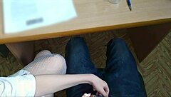 sexy nurse in fishnets gives handjob to patient at office desk