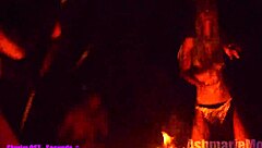 why is this goth slut in bunny costume dancing topless in public cemetery, showing small waist and armpits?