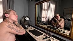 Sexy Tattooed Blonde Girl Does Hair and Makeup Naked in Homemade Video