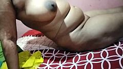 An Indian girl has sex with her boyfriend at home, showcasing raw passion
