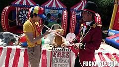 ricky faces intense wrestling with bella in carnival adventure