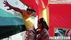 ricky faces intense wrestling with bella in carnival adventure