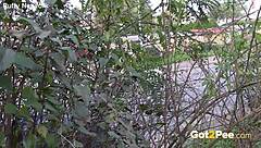 I watch a pretty girl pee in nature