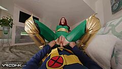 Sexy redhead Phoenix in heels deepthroats big cock. She rides in X-Men cosplay parody.