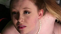 nasty looker gets cumshot on her face eating all the cream