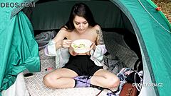 Alisa eats salad naked in the tent