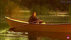 Beautiful brunette with small tits rides strong man doggystyle on boat!