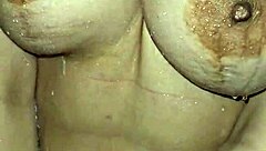 Mature woman enjoys squirting and anal in the shower