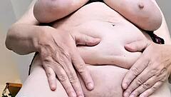 Horny Busty Gilf Teasing In Lingerie Shows HUNGRY Pussy!