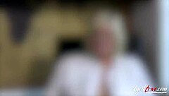 Oldnanny's Horny Mature Striptease Wets Her Hairy Pussy