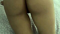 latina moves on big cock in bed