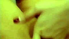 Is She Masturbating While Being Spied On In This Provocative Encounter?