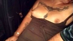 A sexy latina gets groped in an uber ride outdoors.