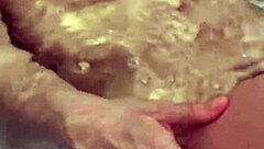 Wife washes body slowly in bath. I want to touch her nipples.