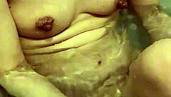 Wife washes body slowly in bath. I want to touch her nipples.