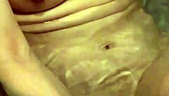 Wife washes body slowly in bath. I want to touch her nipples.