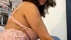 i enjoy watching anna maria's mature latina strip tease in pink lingerie part two