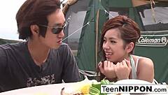 japanese girlfriend blows her guy outdoors