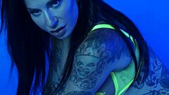 Petite busty milf Joanna Angel slips out of neon lingerie