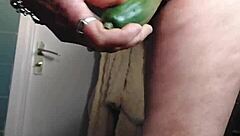 oma casually fucks her hairy pussy with a cucumber