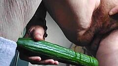 oma casually fucks her hairy pussy with a cucumber