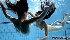 shaved brunette big tits underwater