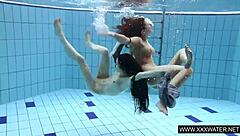 shaved brunette big tits underwater