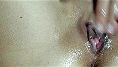 He Oils And Fingers Wet Pussy