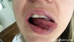 Young blonde amateur performs tongue saliva throat fetish
