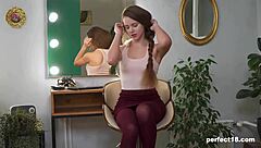 18 teen playing in front of the mirror, feeling adorable and innocent.