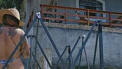 setting up tent in countryside with exhibitionist body in ass