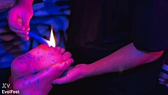 i offer candle wax play on tied feet